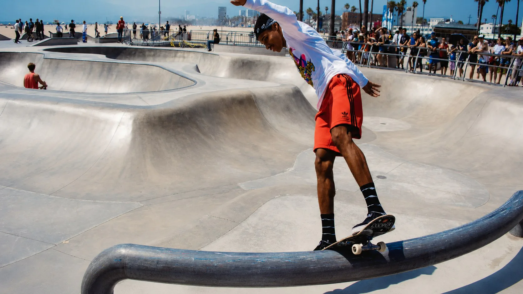 Skateboarder moving through a concrete bowl, inspiration for BOFEI PRO